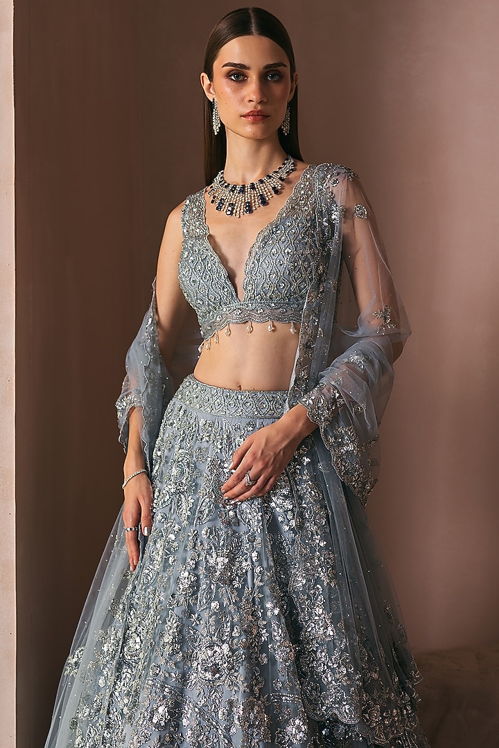Ice Grey Net Cutdana & Sequins Embroidered Bridal Lehenga Set by Angad Singh at Pernia's Pop Up Shop