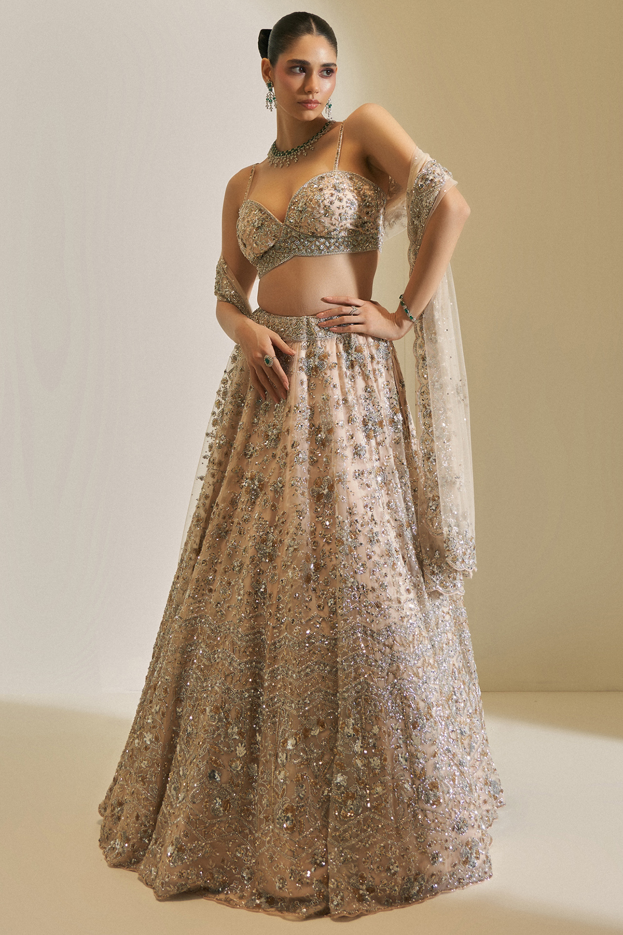 Champagne Gold Net Crystal Embroidered Bridal Lehenga Set by Angad Singh at Pernia's Pop Up Shop
