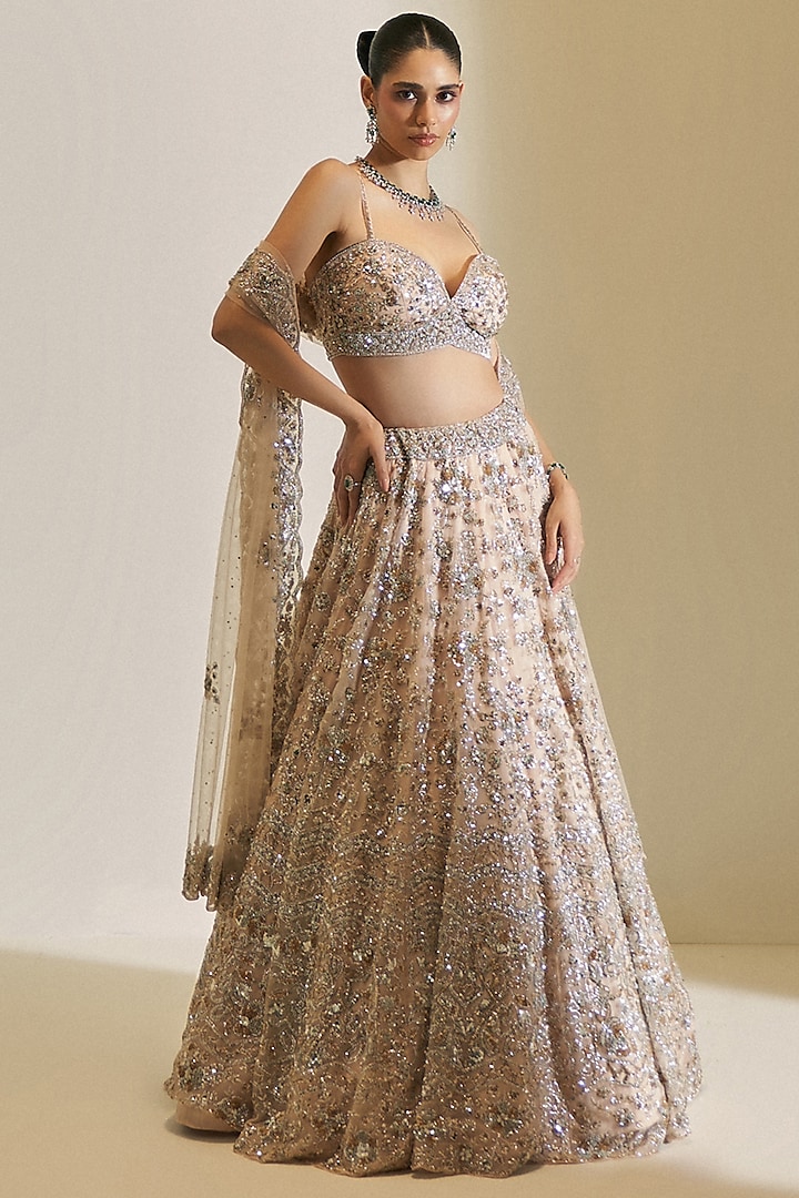 Champagne Gold Net Crystal Embroidered Bridal Lehenga Set by Angad Singh at Pernia's Pop Up Shop