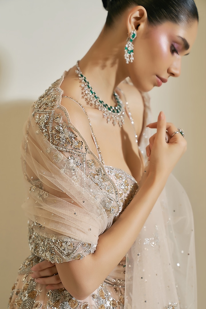 Champagne Gold Net Crystal Embroidered Bridal Lehenga Set by Angad Singh at Pernia's Pop Up Shop