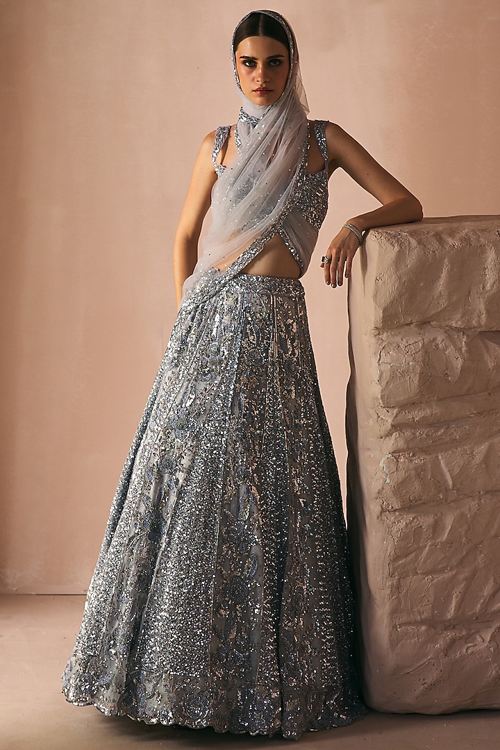 Ice Grey Satin Organza Crystal Embroidered Bridal Lehenga Set by Angad Singh at Pernia's Pop Up Shop