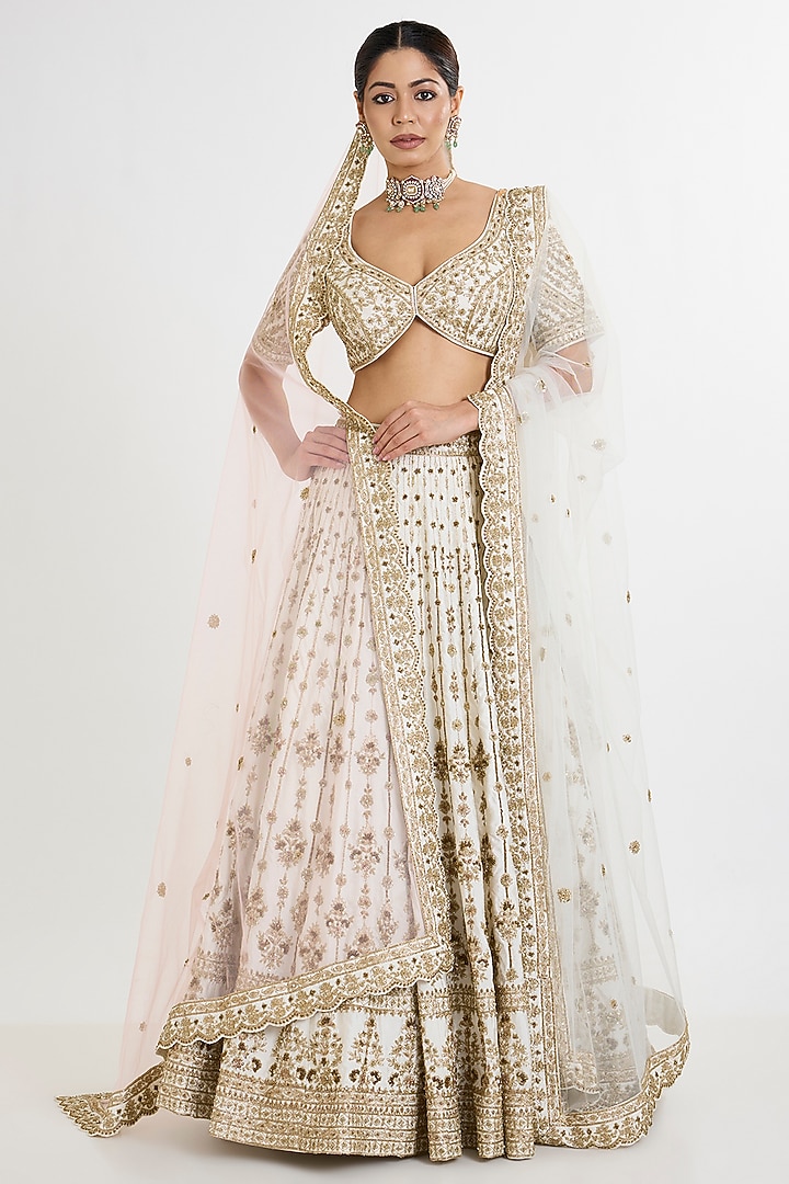 Ivory Raw Silk Embroidered Bridal Lehenga Set by Angad Singh at Pernia's Pop Up Shop