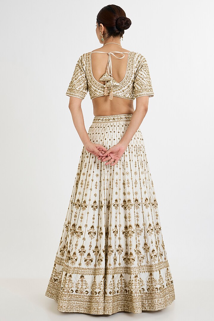 Ivory Raw Silk Embroidered Bridal Lehenga Set by Angad Singh at Pernia's Pop Up Shop