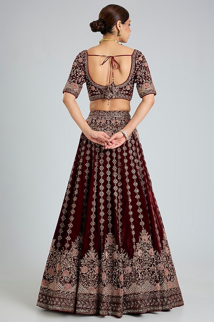 Maroon Velvet Embroidered Wedding Lehenga Set by Angad Singh at Pernia's Pop Up Shop
