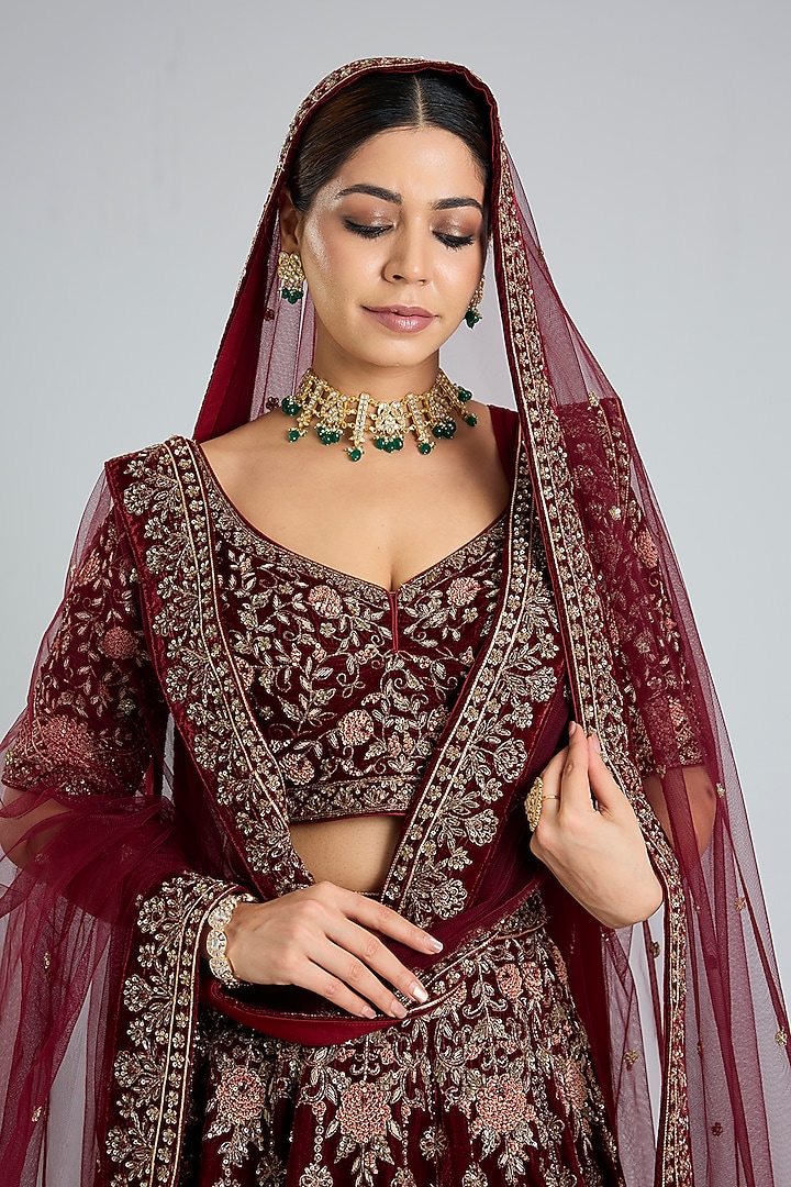 Maroon Velvet Embroidered Wedding Lehenga Set by Angad Singh at Pernia's Pop Up Shop