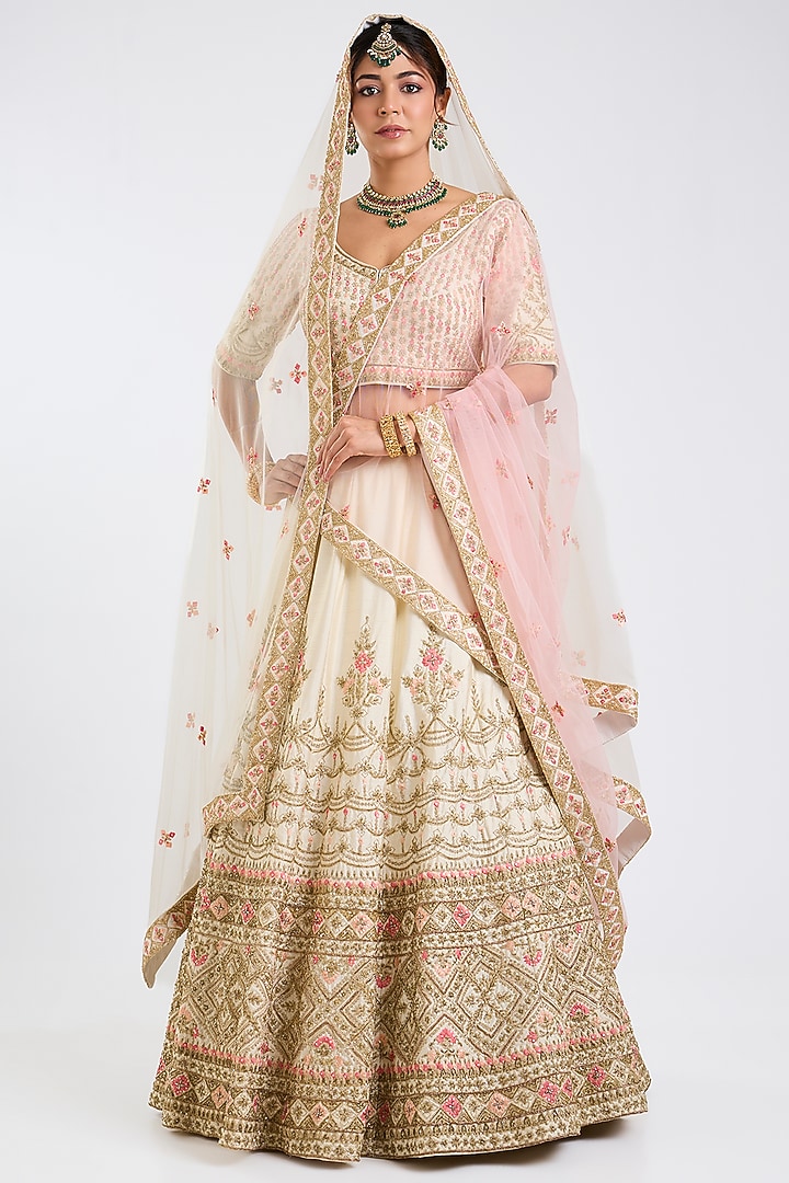 Ivory Raw Silk Embroidered Wedding Lehenga Set by Angad Singh at Pernia's Pop Up Shop