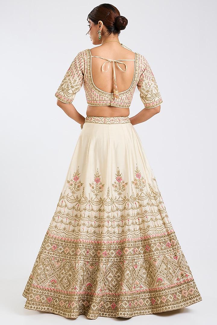 Ivory Raw Silk Embroidered Wedding Lehenga Set by Angad Singh at Pernia's Pop Up Shop