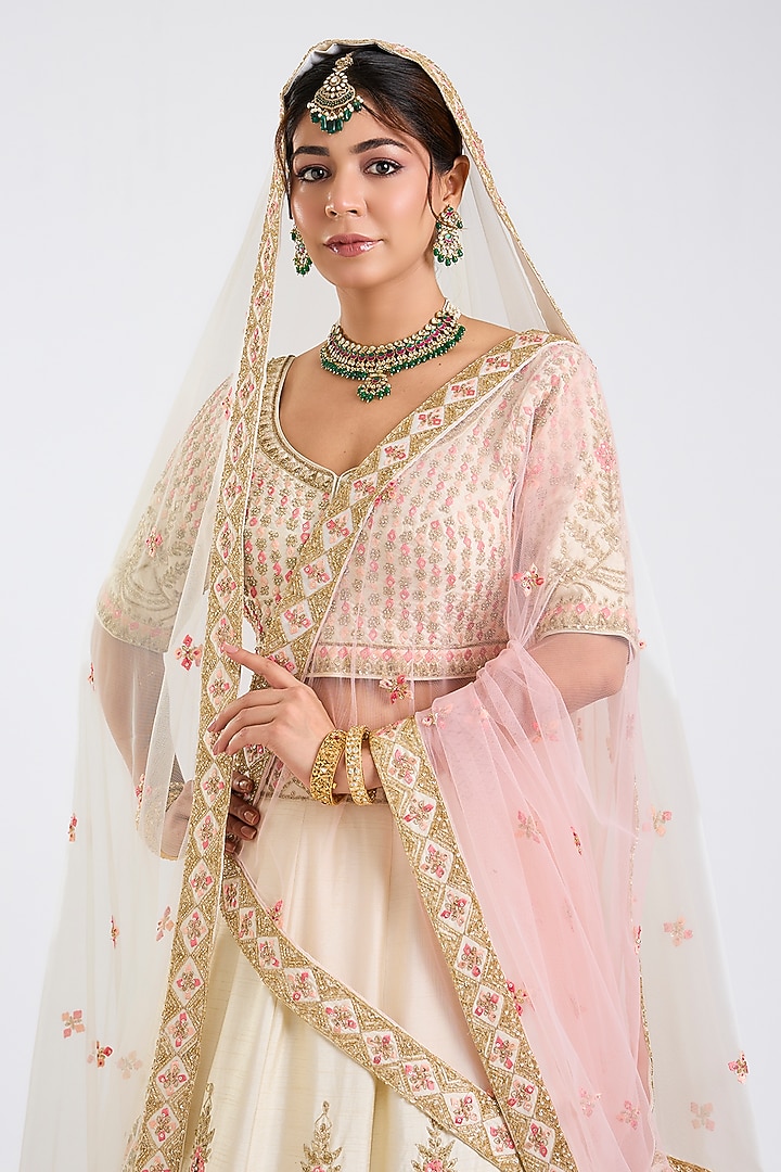 Ivory Raw Silk Embroidered Wedding Lehenga Set by Angad Singh at Pernia's Pop Up Shop