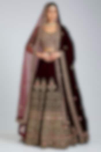 Maroon Velvet Embroidered Wedding Lehenga Set by Angad Singh at Pernia's Pop Up Shop