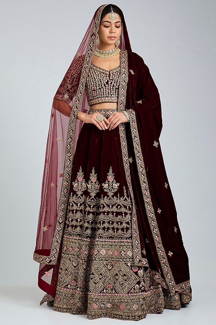 Maroon Velvet Embroidered Wedding Lehenga Set by Angad Singh at Pernia's Pop Up Shop