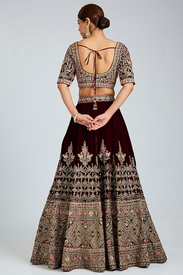 Maroon Velvet Embroidered Wedding Lehenga Set by Angad Singh at Pernia's Pop Up Shop