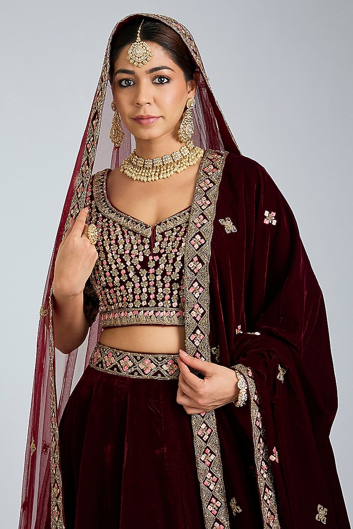 Maroon Velvet Embroidered Wedding Lehenga Set by Angad Singh at Pernia's Pop Up Shop