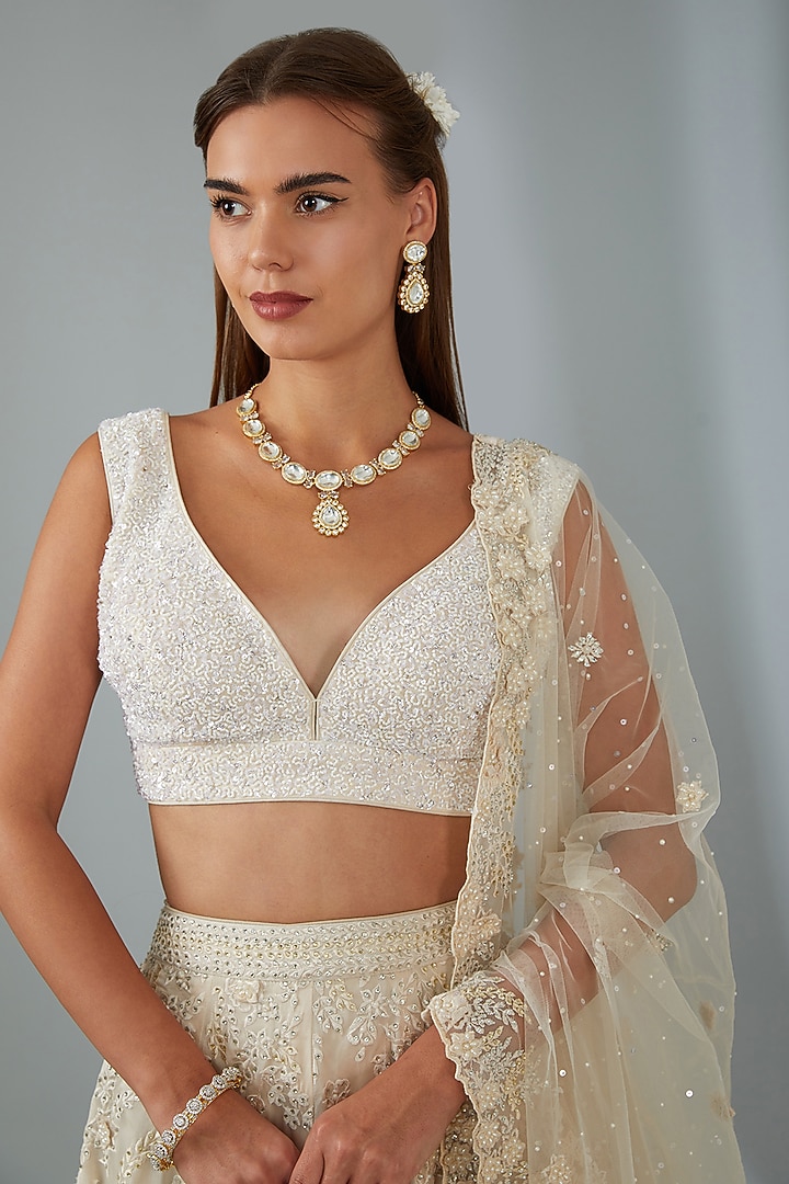 Ivory Raw Silk Hand Embroidered Bridal Lehenga Set by Angad Singh at Pernia's Pop Up Shop