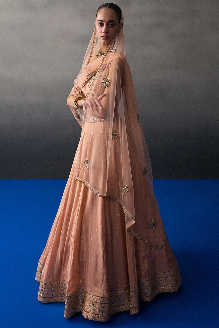 Peach Banarasi Silk Mirror Embroidered Wedding Lehenga Set by Angad Singh at Pernia's Pop Up Shop