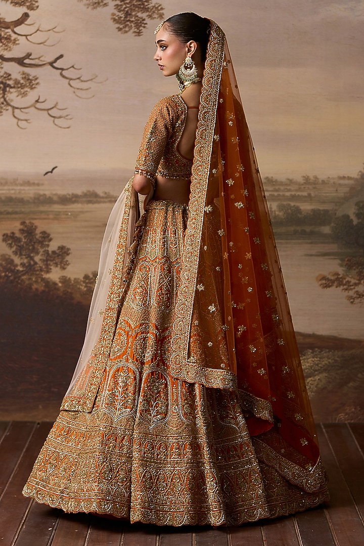 Rust Raw Silk Scalloped Embroidered Bridal Lehenga Set by Angad Singh at Pernia's Pop Up Shop