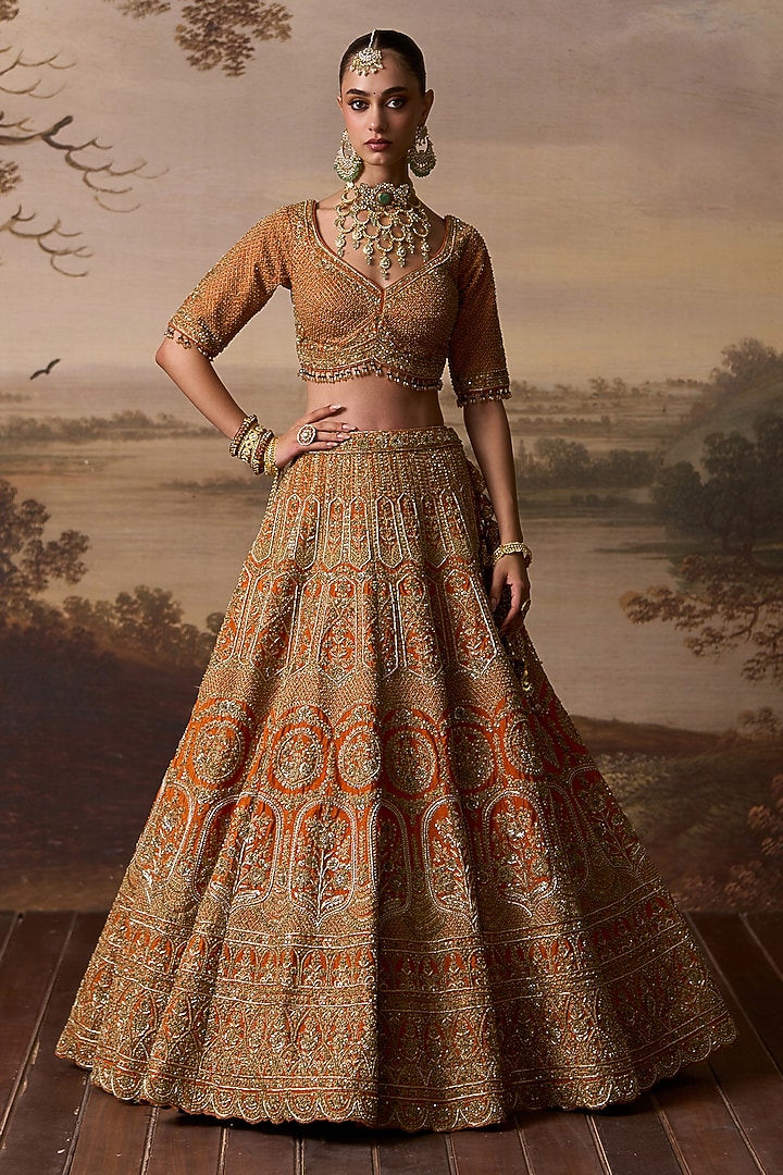 Rust Raw Silk Scalloped Embroidered Bridal Lehenga Set by Angad Singh at Pernia's Pop Up Shop