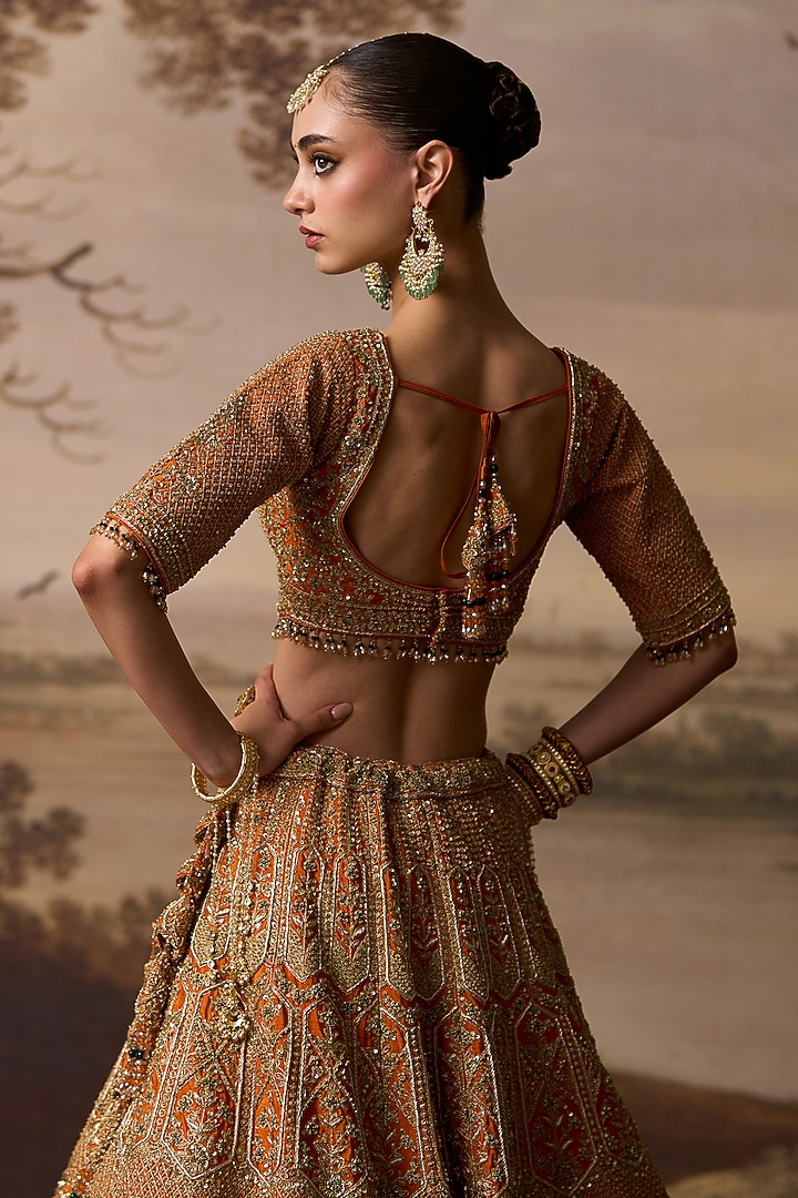 Rust Raw Silk Scalloped Embroidered Bridal Lehenga Set by Angad Singh at Pernia's Pop Up Shop