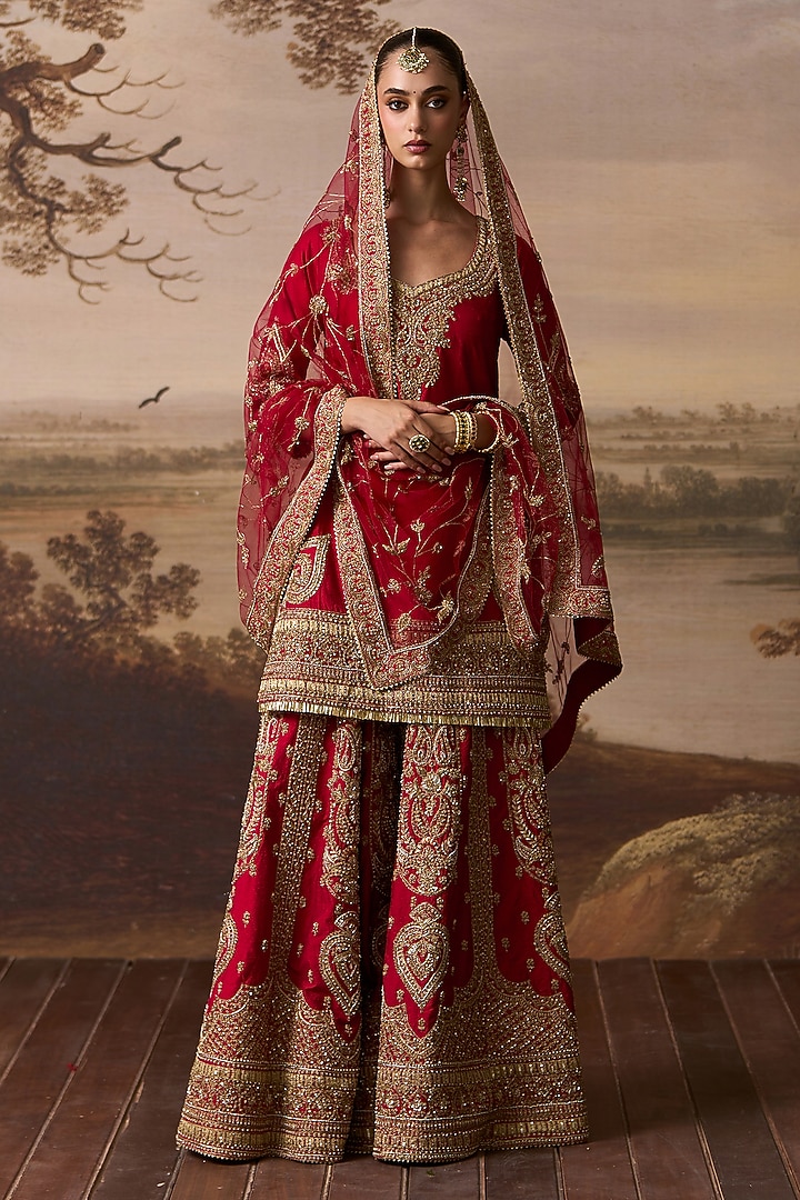 Red Raw Silk Gold Embroidered Bridal Sharara Set by Angad Singh at Pernia's Pop Up Shop