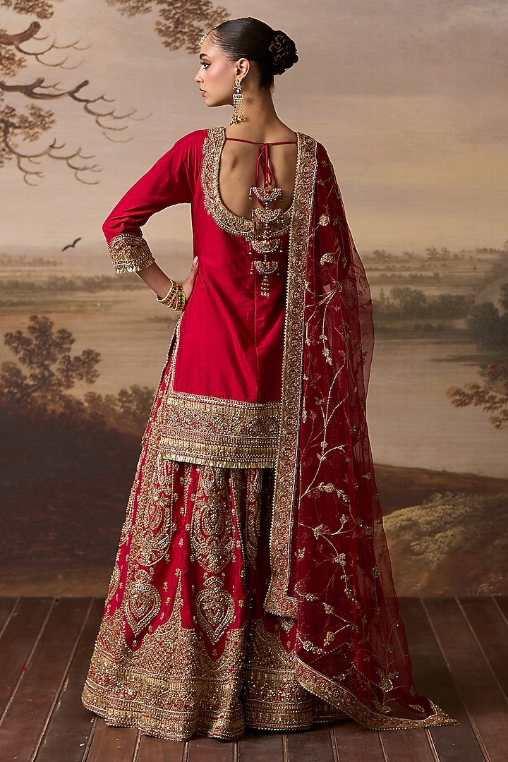 Red Raw Silk Gold Embroidered Bridal Sharara Set by Angad Singh at Pernia's Pop Up Shop