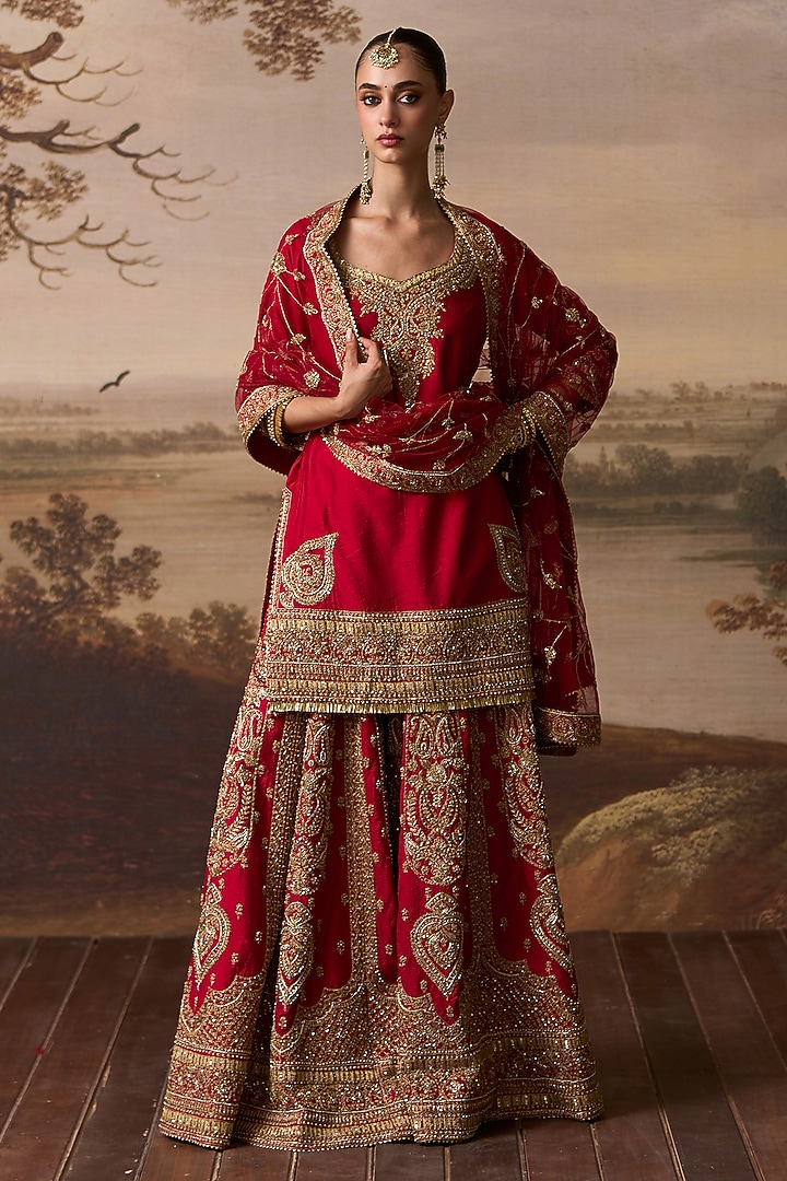 Red Raw Silk Gold Embroidered Bridal Sharara Set by Angad Singh at Pernia's Pop Up Shop