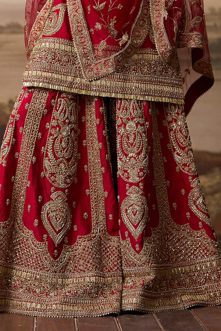 Red Raw Silk Gold Embroidered Bridal Sharara Set by Angad Singh at Pernia's Pop Up Shop