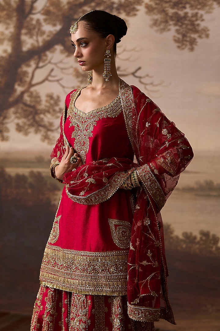 Red Raw Silk Gold Embroidered Bridal Sharara Set by Angad Singh at Pernia's Pop Up Shop