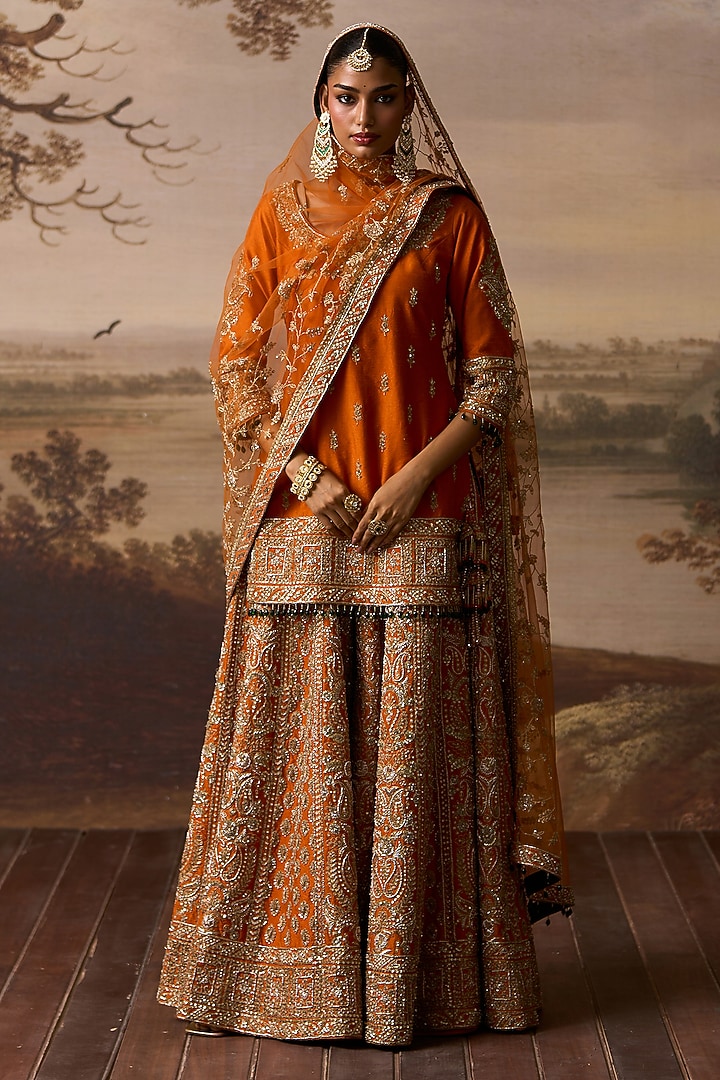 Rust Raw Silk Gold Embroidered Bridal Sharara Set by Angad Singh at Pernia's Pop Up Shop