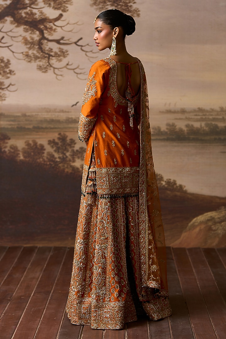 Rust Raw Silk Gold Embroidered Bridal Sharara Set by Angad Singh at Pernia's Pop Up Shop