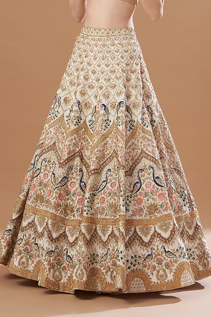 Ivory Raw Silk Embroidered Wedding Lehenga Set by Angad Singh at Pernia's Pop Up Shop