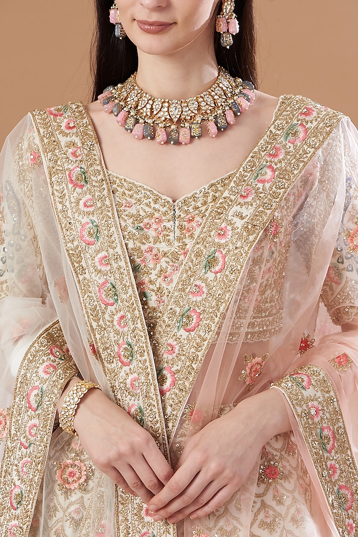 Ivory Raw Silk Embroidered Wedding Lehenga Set by Angad Singh at Pernia's Pop Up Shop