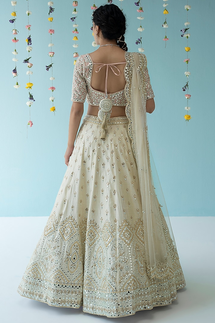 Ivory Raw Silk Embroidered Wedding Lehenga Set by Angad Singh at Pernia's Pop Up Shop