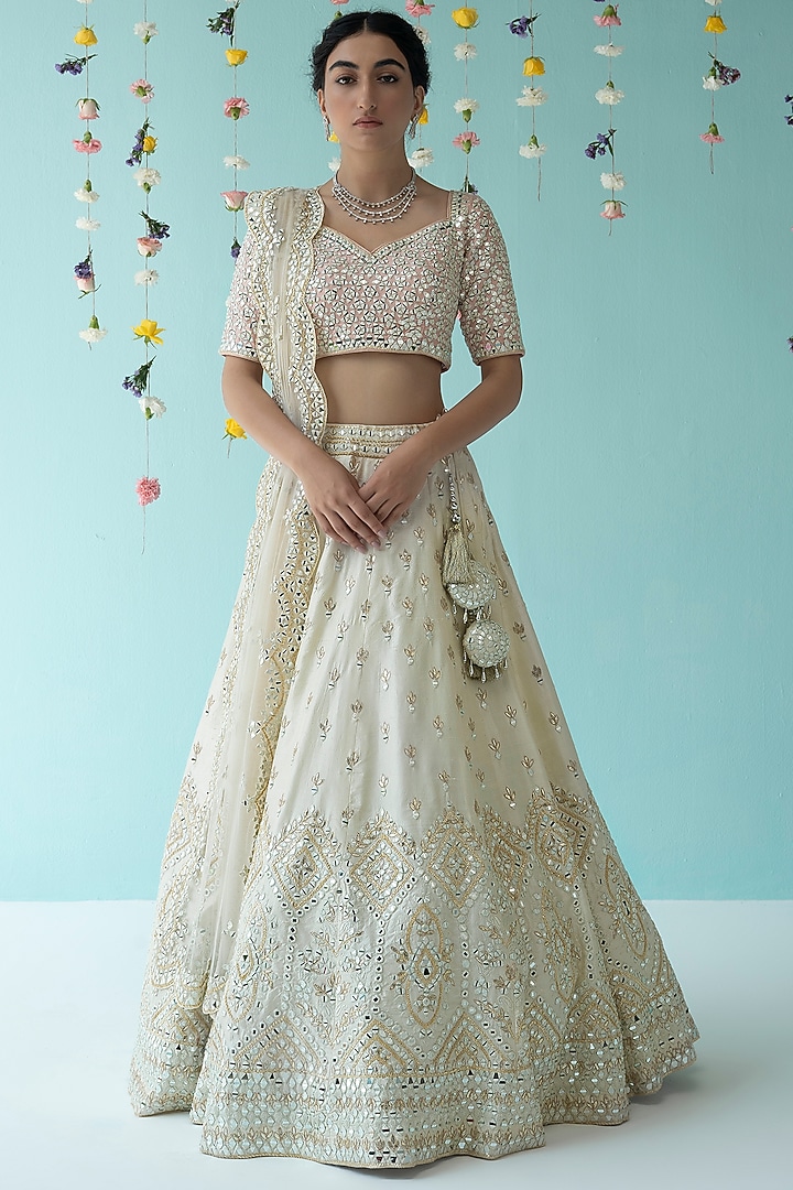 Ivory Raw Silk Embroidered Wedding Lehenga Set by Angad Singh at Pernia's Pop Up Shop
