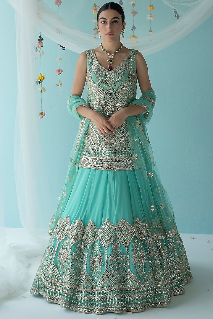 Turquoise Net Embroidered Lehenga Set by Angad Singh