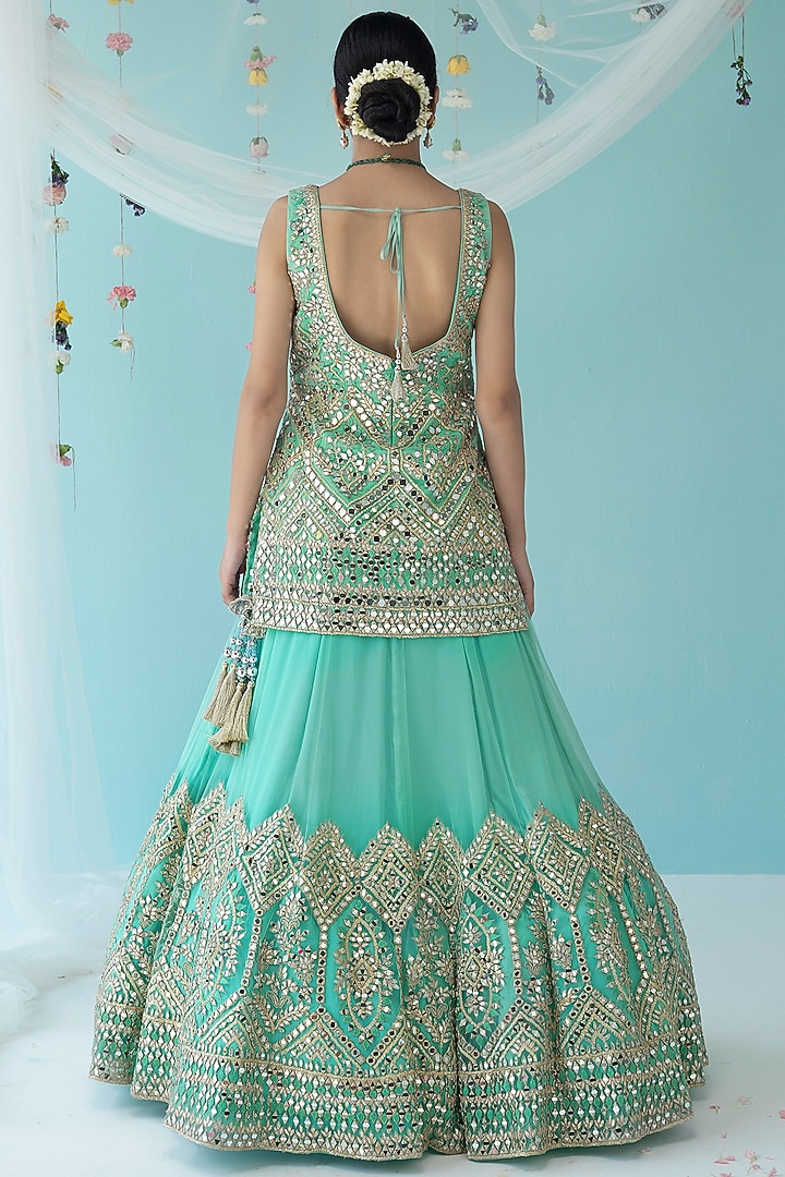Turquoise Net Embroidered Wedding Lehenga Set by Angad Singh at Pernia's Pop Up Shop