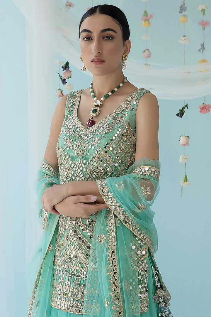 Turquoise Net Embroidered Wedding Lehenga Set by Angad Singh at Pernia's Pop Up Shop
