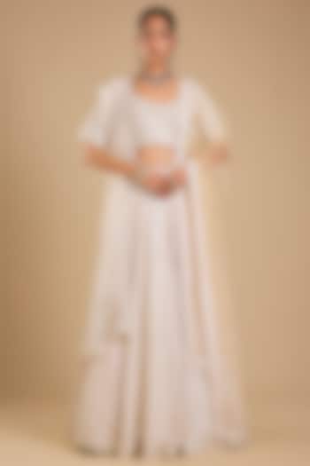 Ivory Raw Silk Embroidered Bridal Lehenga Set by Angad Singh at Pernia's Pop Up Shop