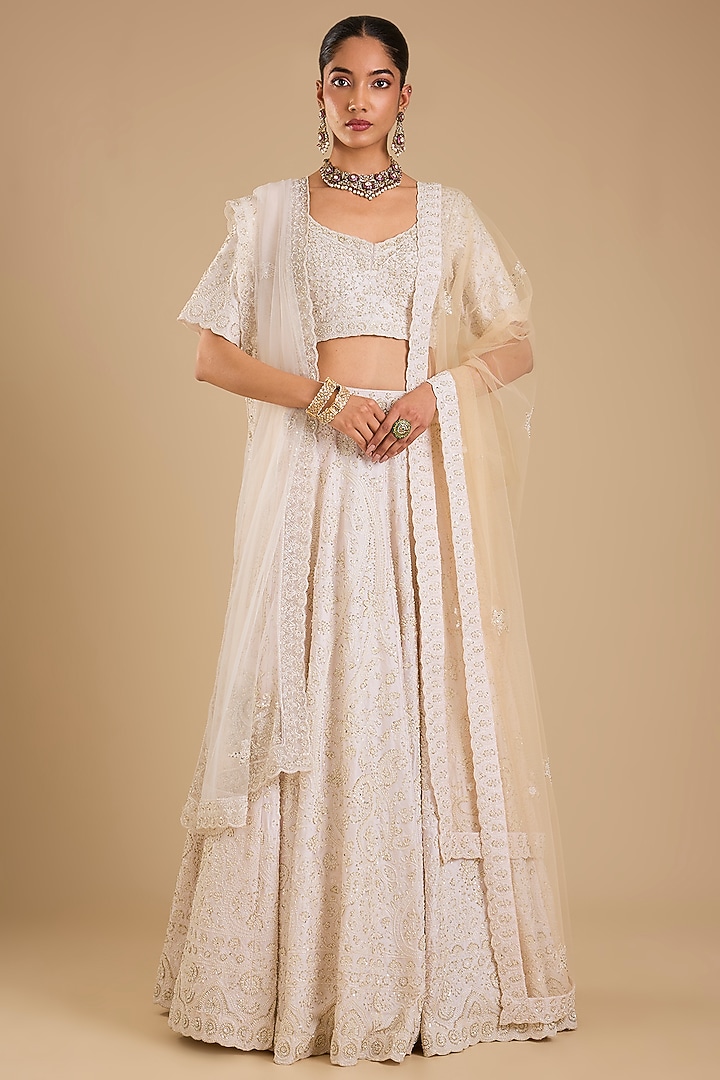 Ivory Raw Silk Embroidered Bridal Lehenga Set by Angad Singh at Pernia's Pop Up Shop