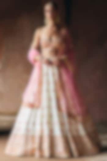 Ivory Raw Silk Mirror Embroidered Wedding Lehenga Set by Angad Singh at Pernia's Pop Up Shop