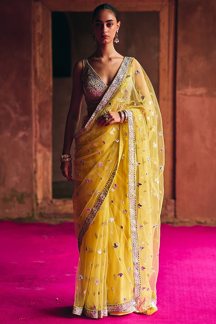Yellow Net Mirror Embroidered Wedding Saree Set by Angad Singh at Pernia's Pop Up Shop