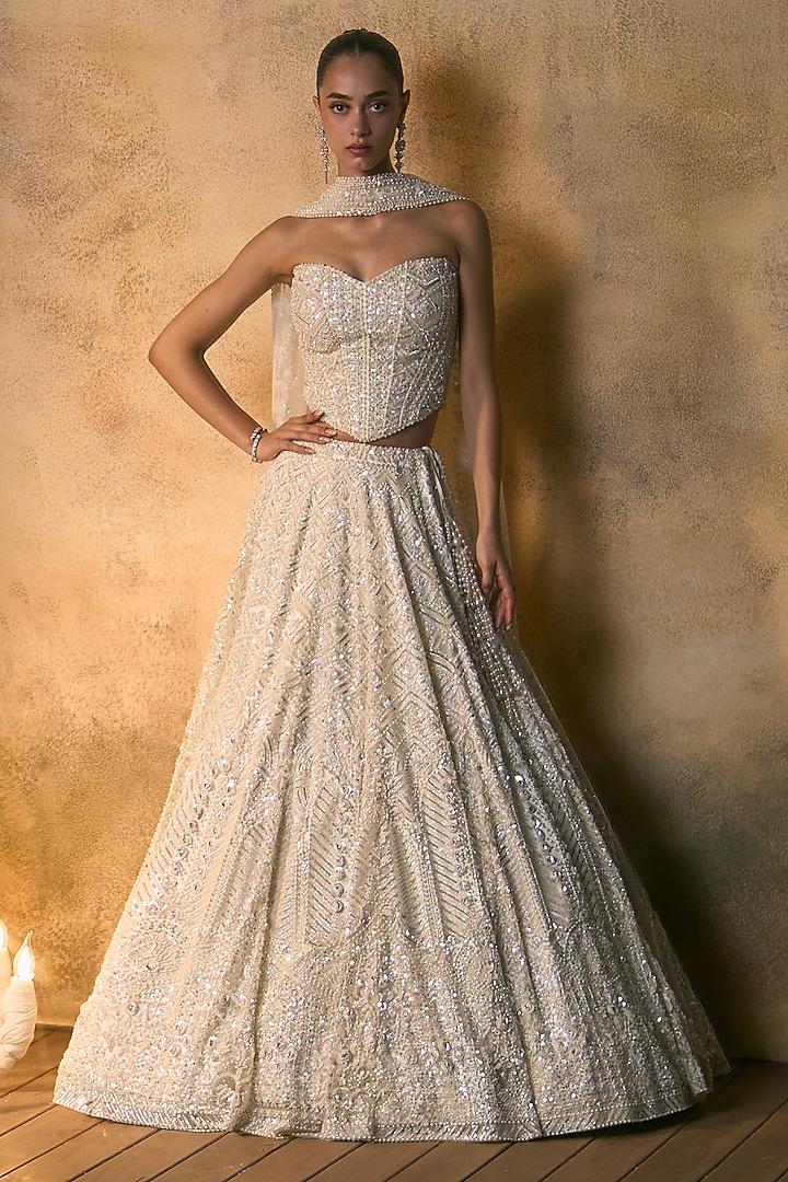 Ivory Net Embroidered Bridal Bridal Lehenga Set by Angad Singh at Pernia's Pop Up Shop