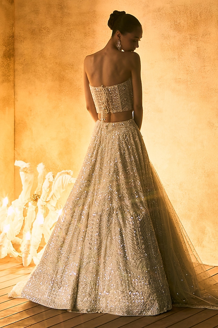 Ivory Net Embroidered Bridal Bridal Lehenga Set by Angad Singh at Pernia's Pop Up Shop