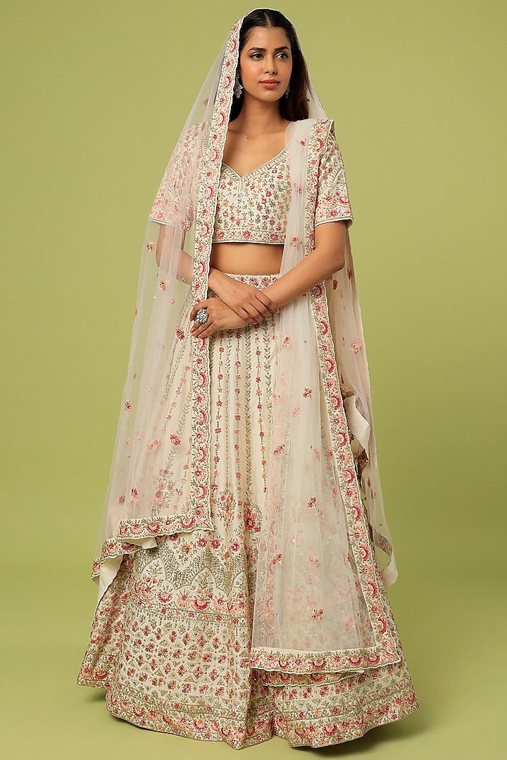 Ivory Raw Silk Embellished Wedding Lehenga Set by Angad Singh at Pernia's Pop Up Shop