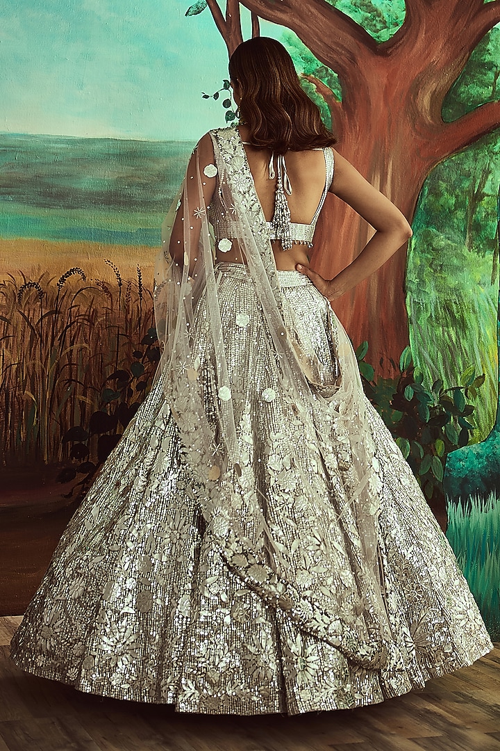 Metallic Silver Net Embroidered Bridal Lehenga Set by Angad Singh at Pernia's Pop Up Shop