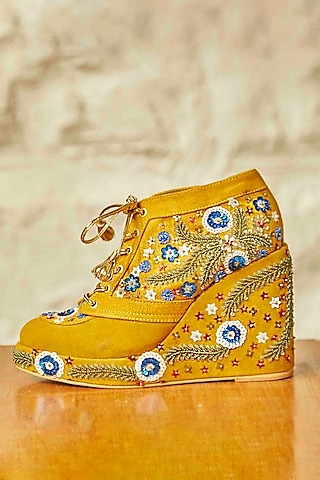 Mustard Faux Suede Leather Embroidered Sneaker Wedges by TIESTA