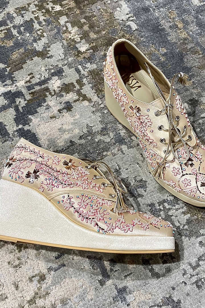 Gold Faux Leather Embroidered Sneaker Wedges by TIESTA at Pernia's Pop Up Shop