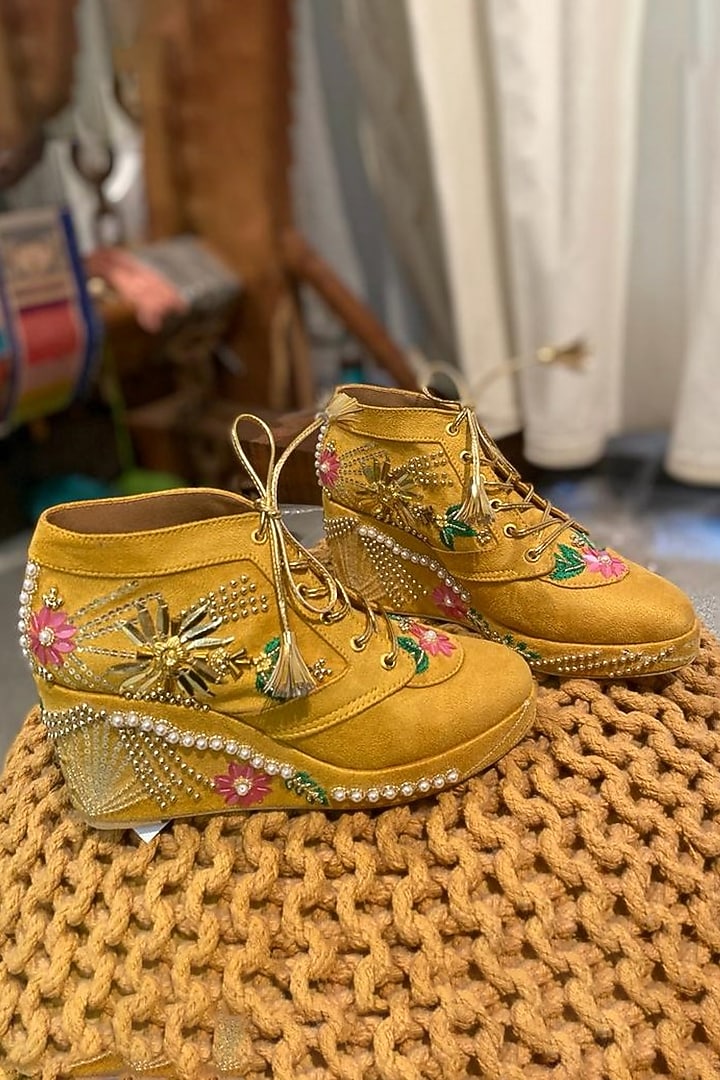 Mustard Faux Leather Embroidered Sneaker Wedges by TIESTA at Pernia's Pop Up Shop