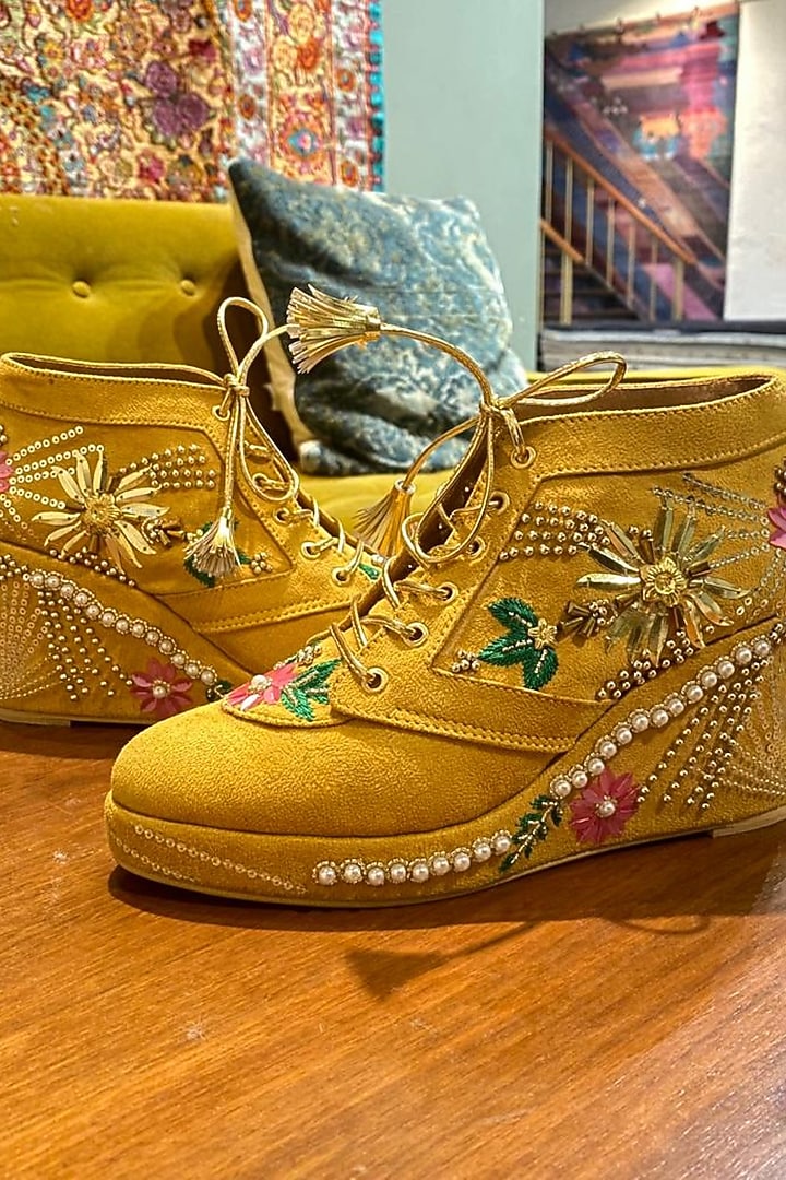 Mustard Faux Leather Embroidered Sneaker Wedges by TIESTA at Pernia's Pop Up Shop