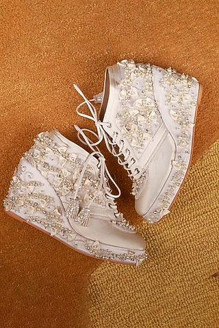 White Faux Leather Embroidered Sneaker Wedges by TIESTA