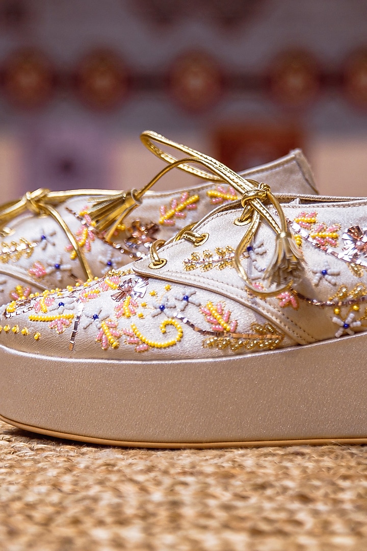Gold Faux Leather Embroidered Sneaker Wedges by TIESTA at Pernia's Pop Up Shop