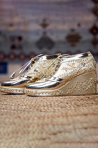 Gold Faux Leather Hand Embroidered Sneaker Wedges by TIESTA